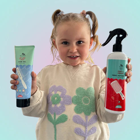 Petite fille avec la gamme capillaire naturel no nasties kids 