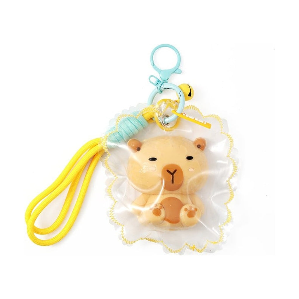 Porte-clés squishy capybara JellyPop dans sa coque transparente